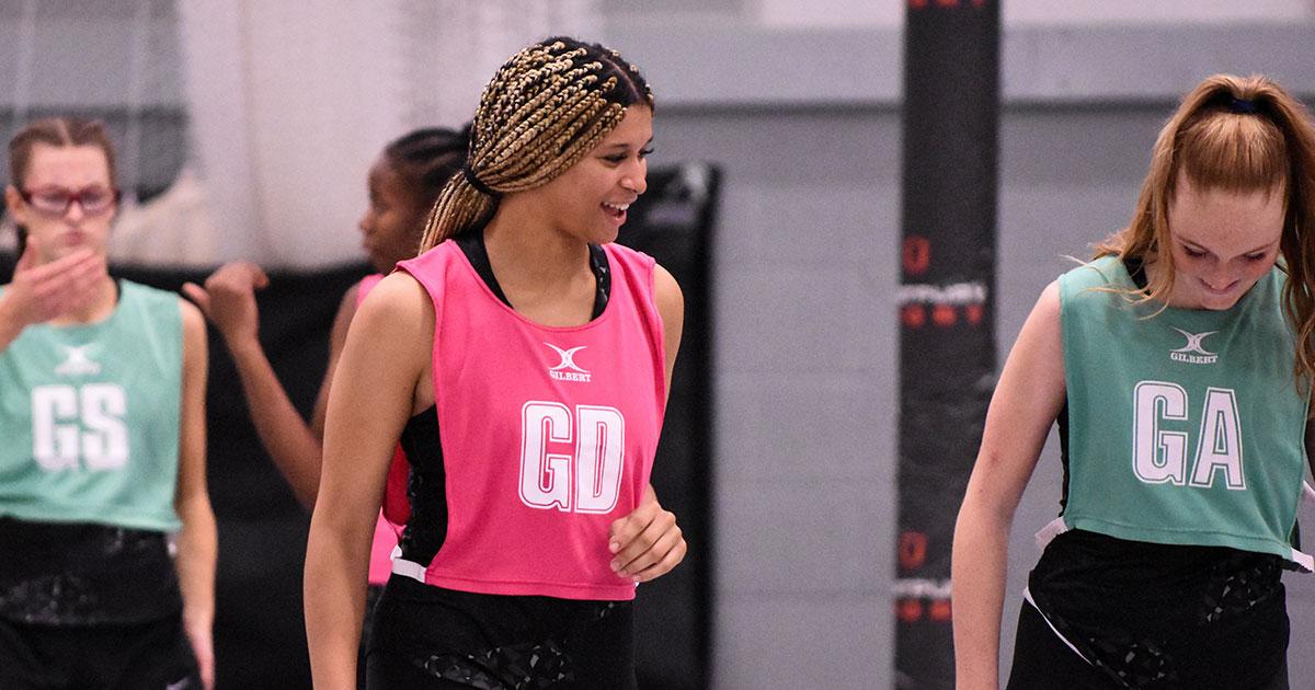 Female Netball player in vest