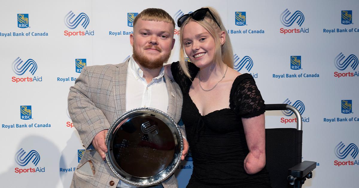 Ellie and Mark with winners trophy