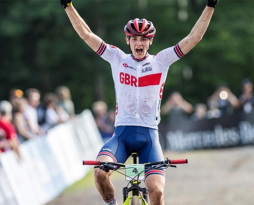 Cyclist celebrating winning a race