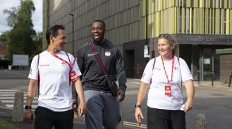 Male and Female Athlete with instructor